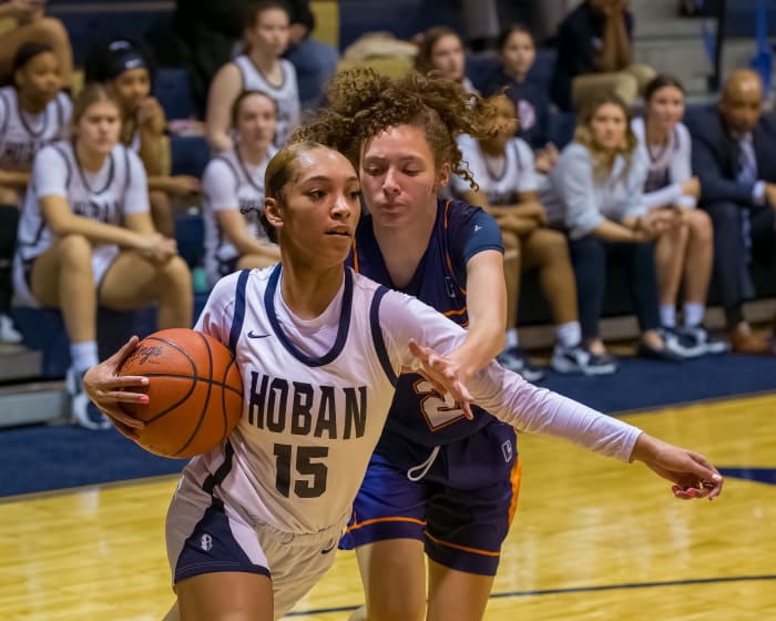 Archbishop Hoban's Mackenzie Edingburgh drives by an Ellet defender in their game in 2022. Photo credit: Mike Cook, SBLive Sports